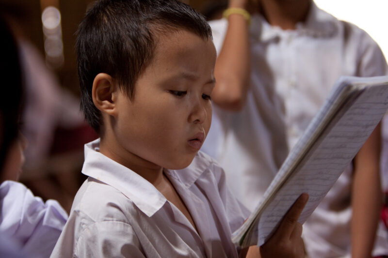 Student in a Refugee Camp — Karen people from Myanmar (Burma) have spent years in in refugee camps along the Thai/Burma border, to avoid violence from the mi...