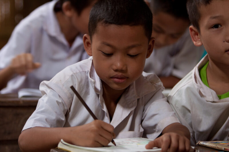 Boys in a Refugee Camp — Karen people from Myanmar (Burma) have spent years in in refugee camps along the Thai/Burma border, to avoid violence from the milit...