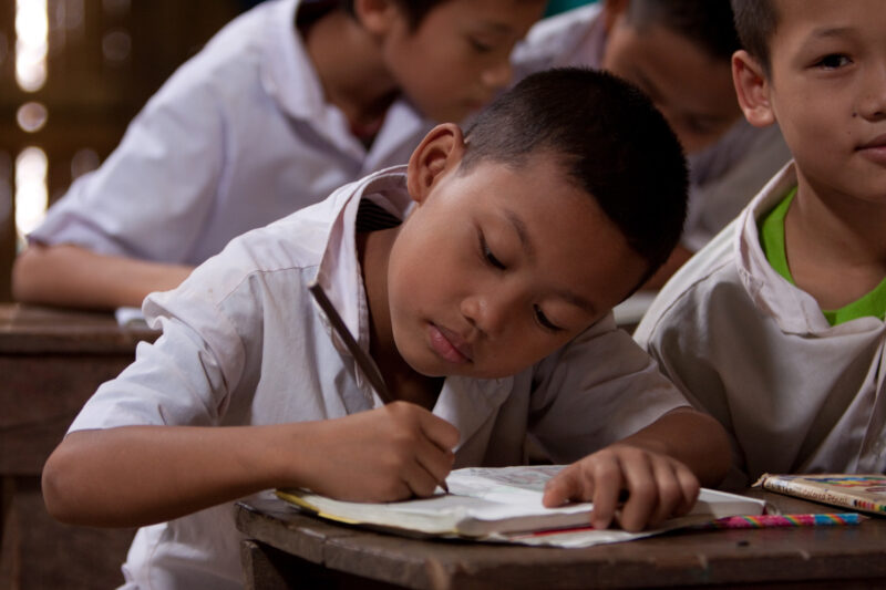 Boys in a Refugee Camp — Karen people from Myanmar (Burma) have spent years in in refugee camps along the Thai/Burma border, to avoid violence from the milit...