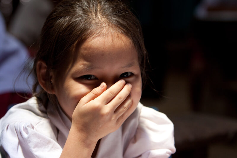 Student in a Refugee Camp — Karen people from Myanmar (Burma) have spent years in in refugee camps along the Thai/Burma border, to avoid violence from the mi...