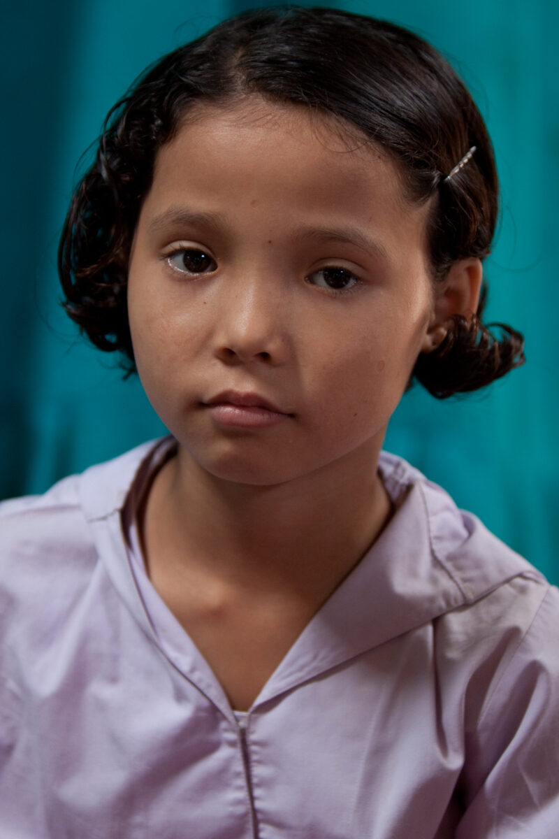 Student in a Refugee Camp — Karen people from Myanmar (Burma) have spent years in in refugee camps along the Thai/Burma border, to avoid violence from the mi...