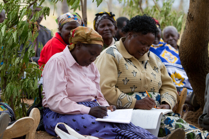 Agricultural Instruction — At a field training session, Kenyans learn new techniques for growing better craps and kitchen gardens. — Kenya, Africa, training,...