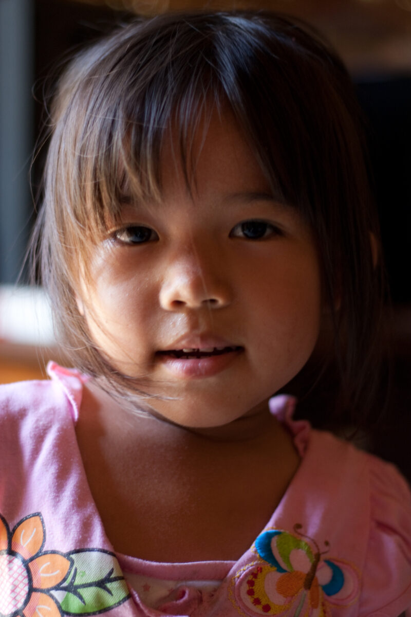 Girl in Laos — Stock Images of the faces of young girls, living in Laos, Southeast Asia — Laos, Southeast Asia, faces, child, children girls