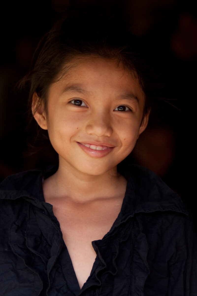 Girl in Laos — Stock Images of the faces of young girls, living in Laos, Southeast Asia — Laos, Southeast Asia, faces, child, children girls