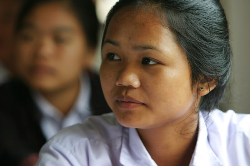 Woman in laos — High School students learn about HIV and AIDS, at a health program conducted at their school in a awareness program sponsored by ADRA. — Laos...