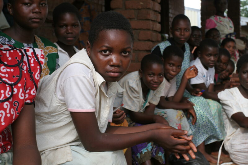 Children in Malawi — Children gather to receive health training from ADRA outside their school in Malawi Africa. — Malawi, Africa, children, students, health...