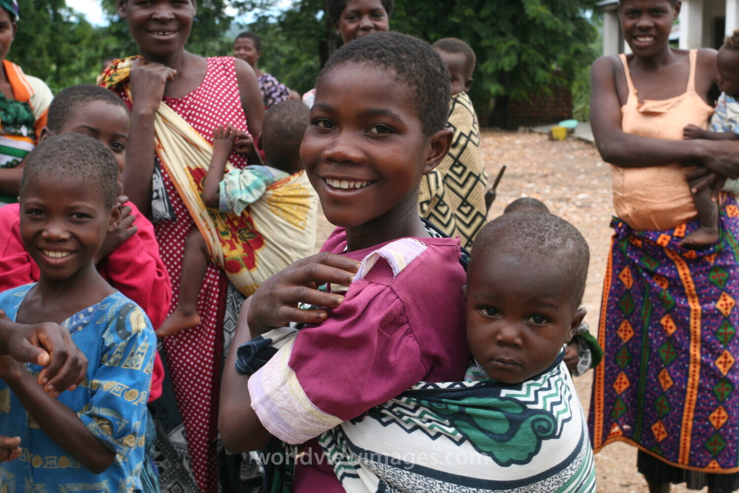 Girl with Baby on Back