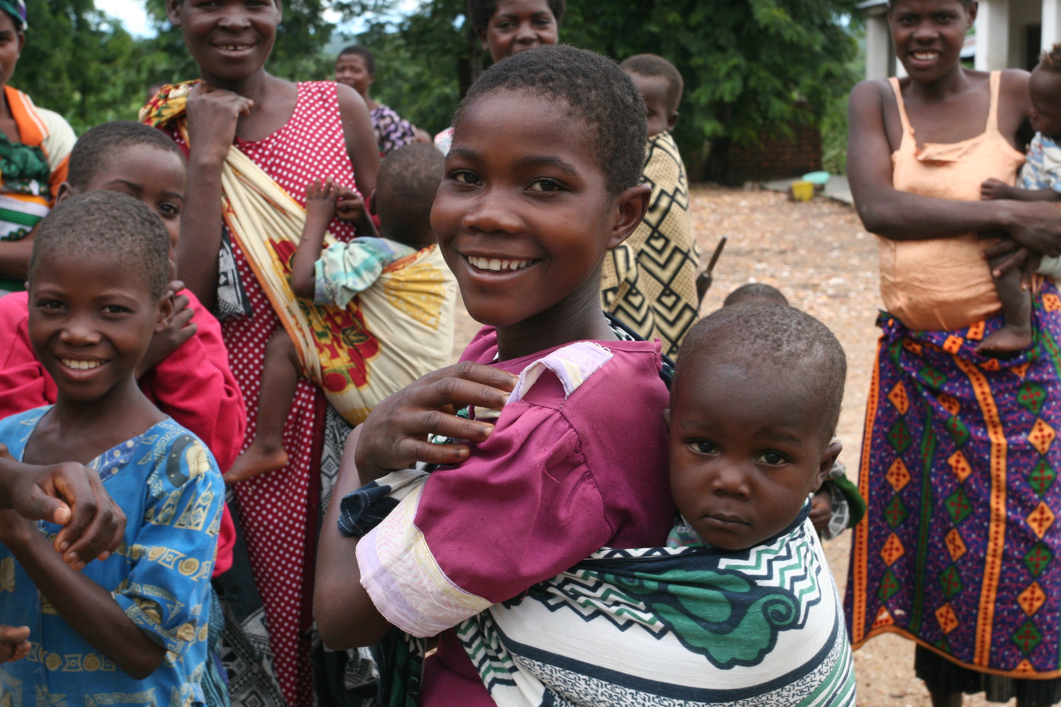 Girl with Baby on Back