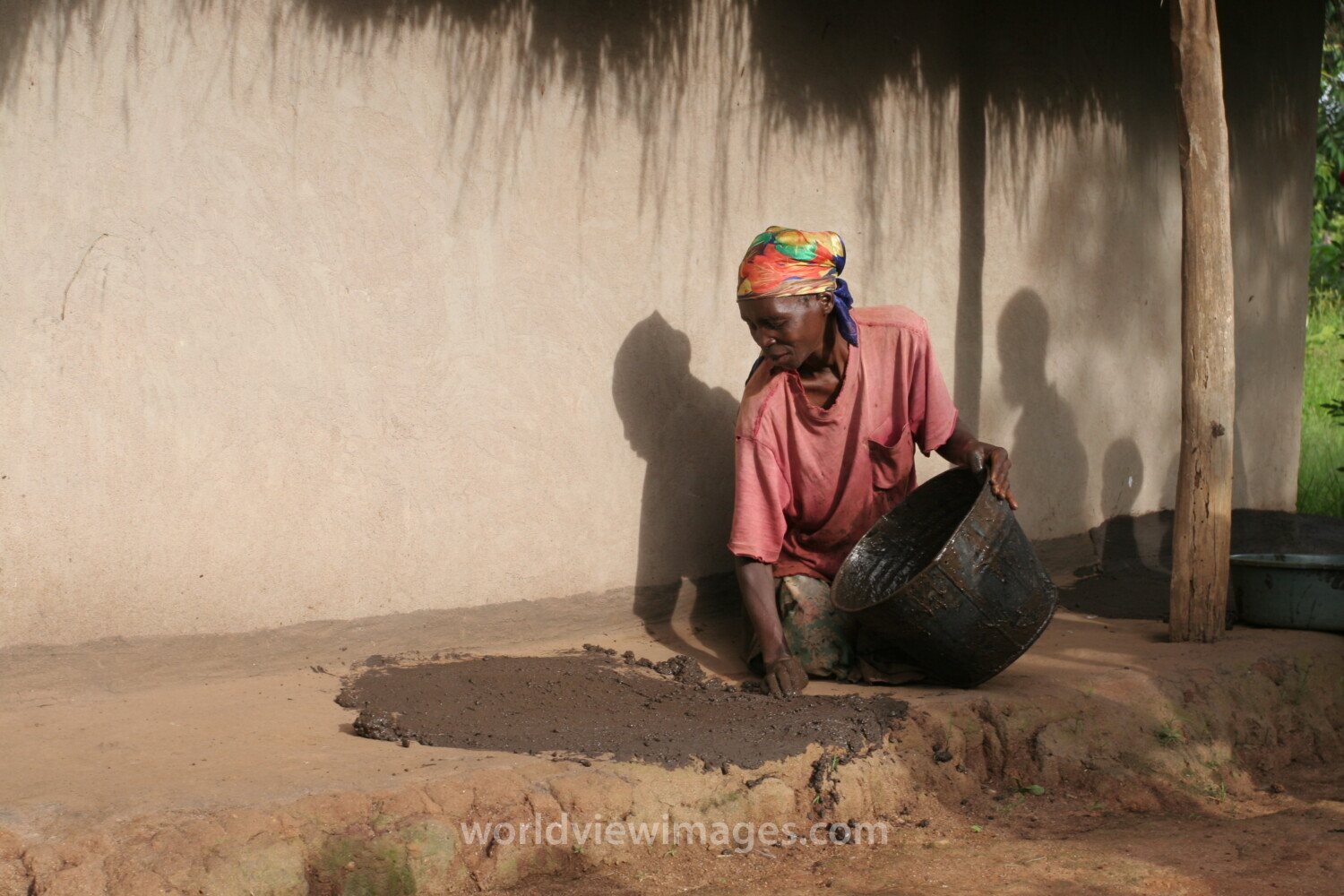 Woman with Mud Mixture