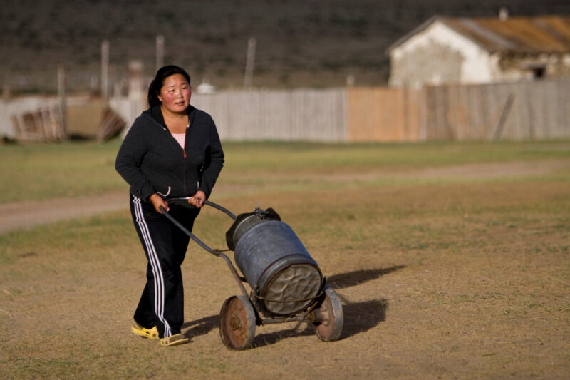 Collecting Water in Mongolia — Woman collects water in Mongolia — Mongolia, woman, collecting water, water security