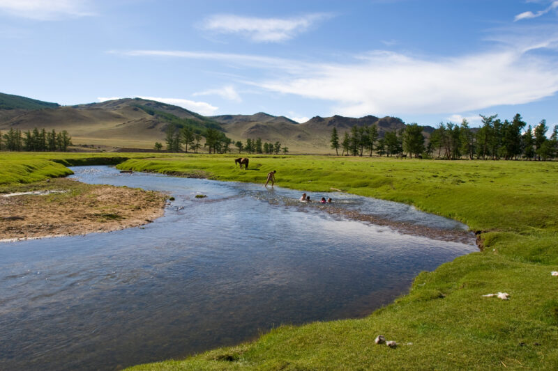 Swiming in the River — Children swim in the mountain fed river that flows by their gers on the Steppes of Mongolia — Mongolia, Steps, steppes, children, river
