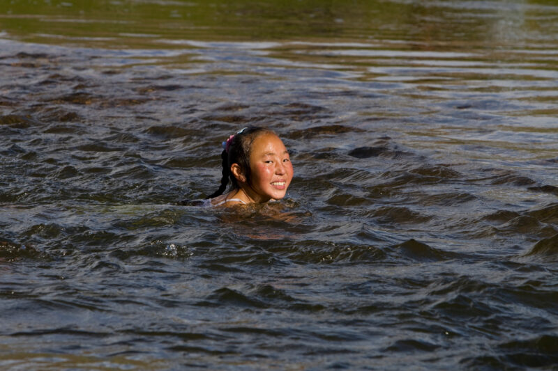 Swiming in the River — Children swim in the mountain fed river that flows by their gers on the Steppes of Mongolia — Mongolia, Steps, steppes, children, river