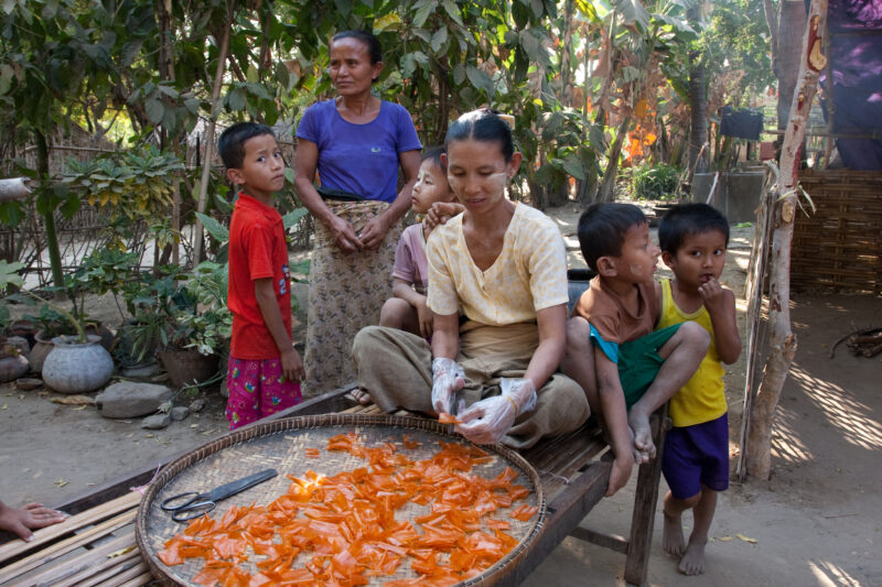Making Treats in Myanmar — Woman makes snack food at her home in Myanmar as a source of income she learned from an ADRA program — ADRA, Burma, Myanmar. incom...