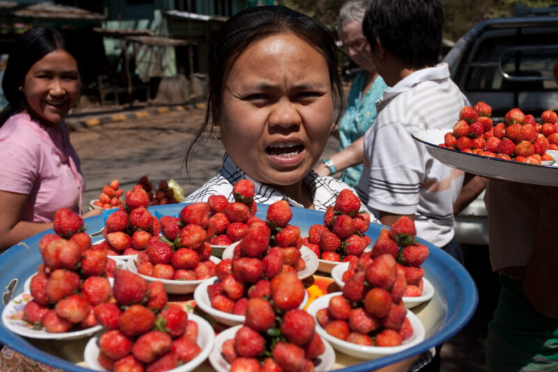 Selling Strawberries in Burma — Burmese woman sells strawberries on the street — Burma, Myanmar, woman, strawberries, selling