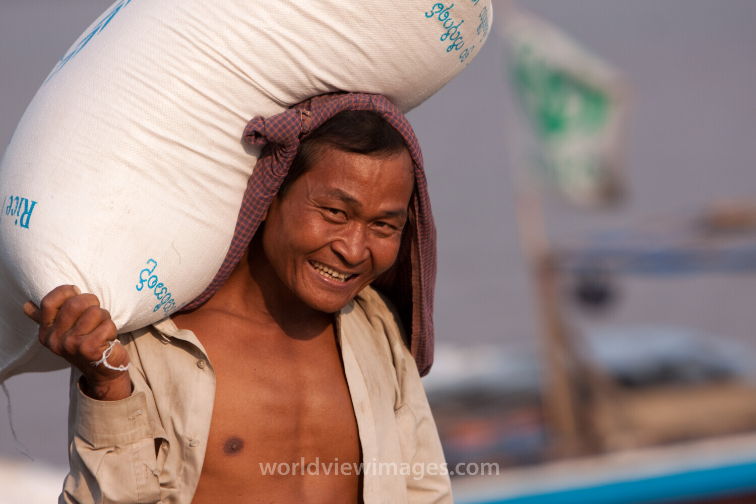 Man with Sack of Rice