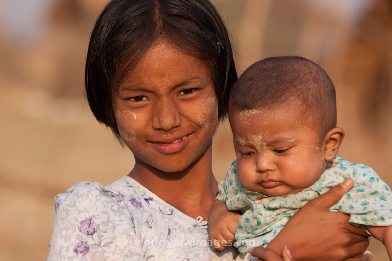 Girl and Baby in Burma