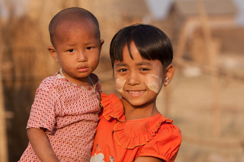 Girl and Baby in Burma — Images of girls living on a sand bar island on the Ayeyarwaddy river in Burma, near old Bagan. — Burma, Myanmar, child, children, faces