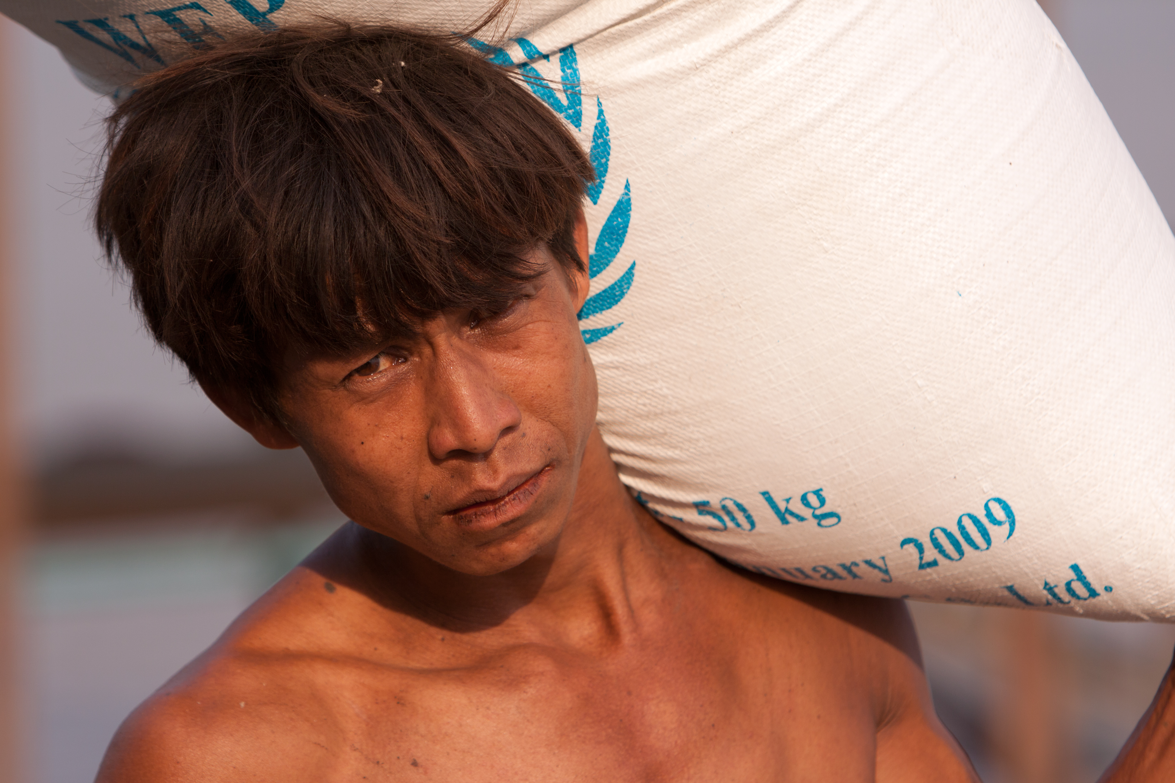 Loading the Boat with Rice in Burma