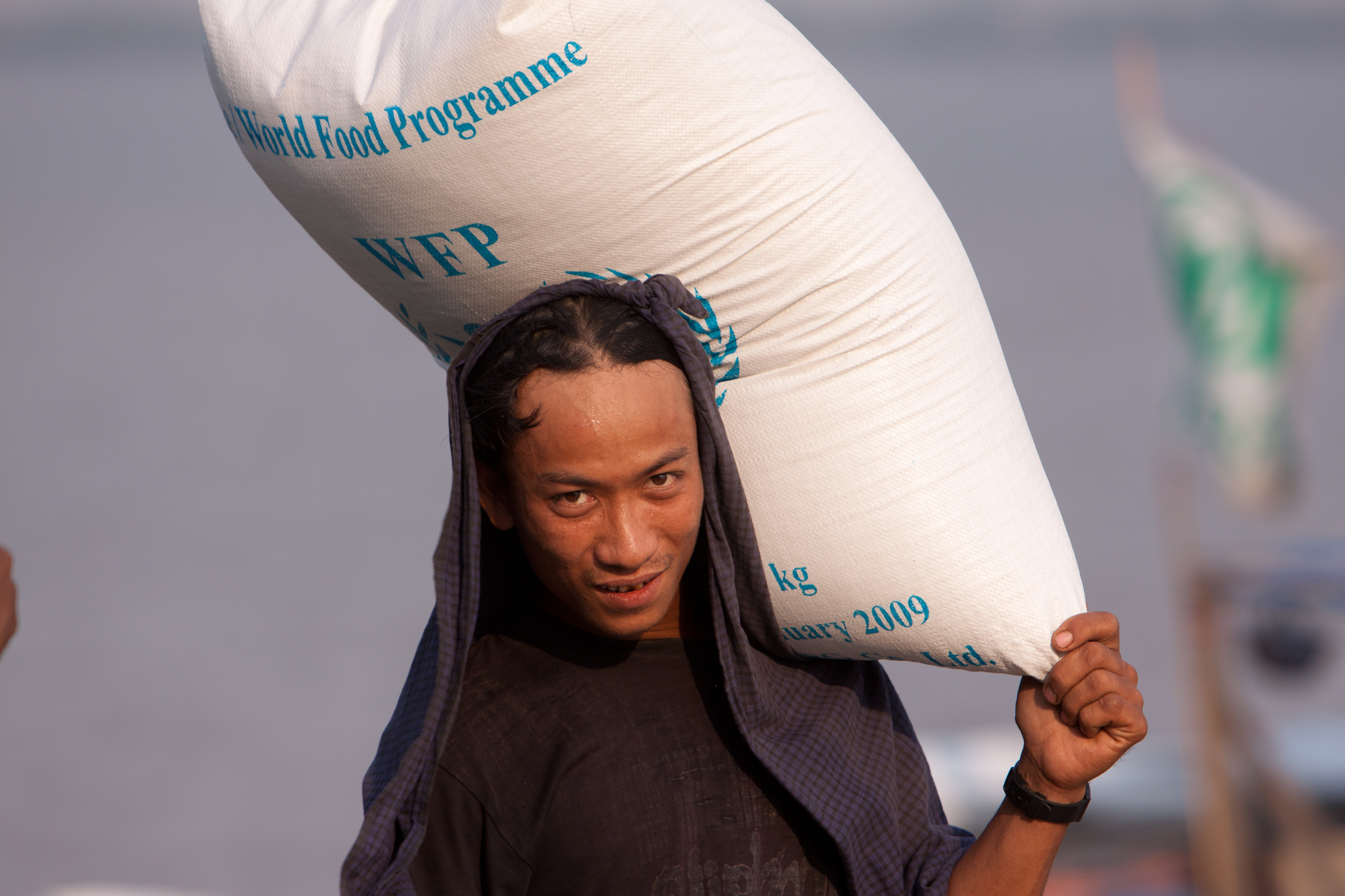 Loading the Boat with Rice in Burma