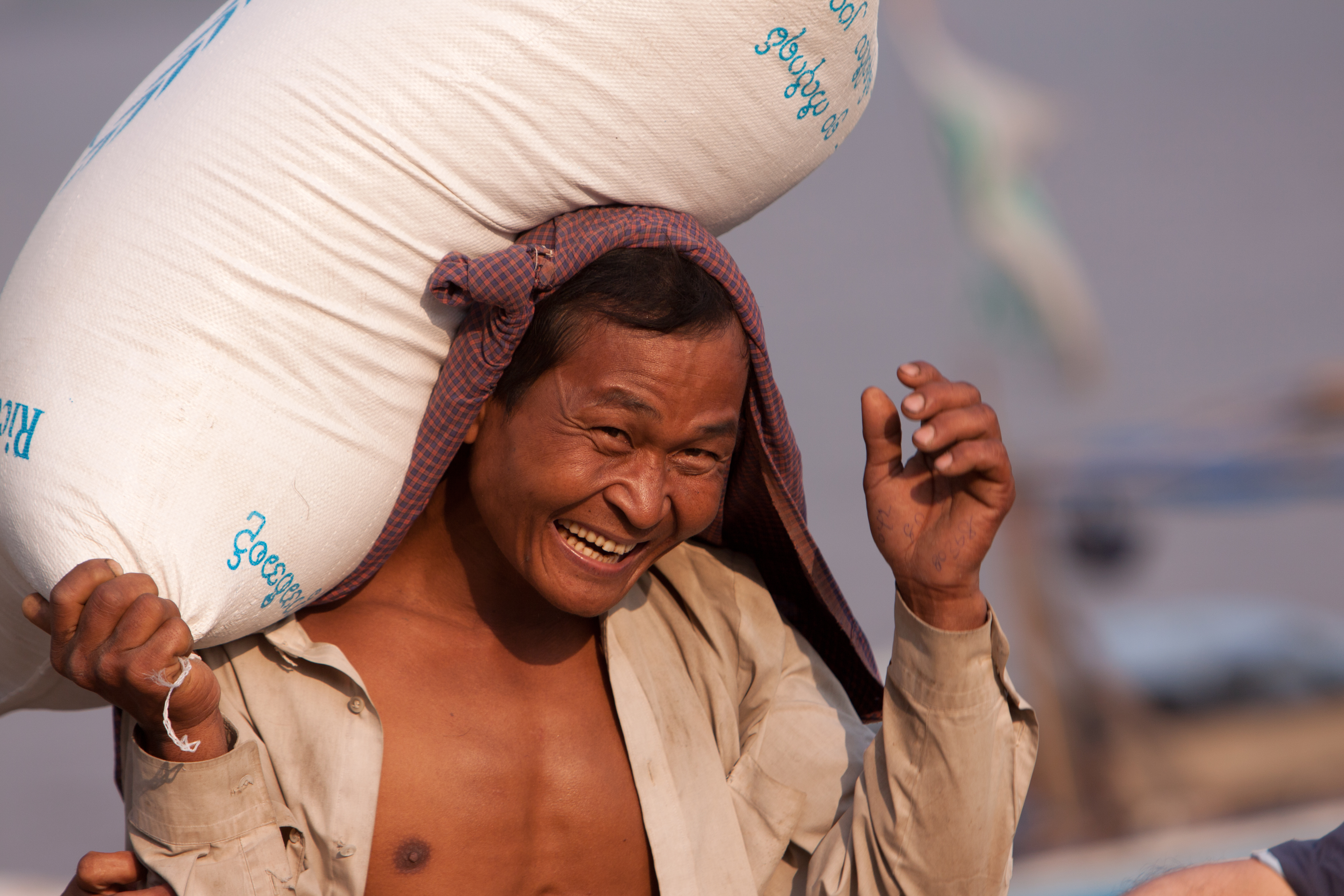 Loading the Boat with Rice in Burma