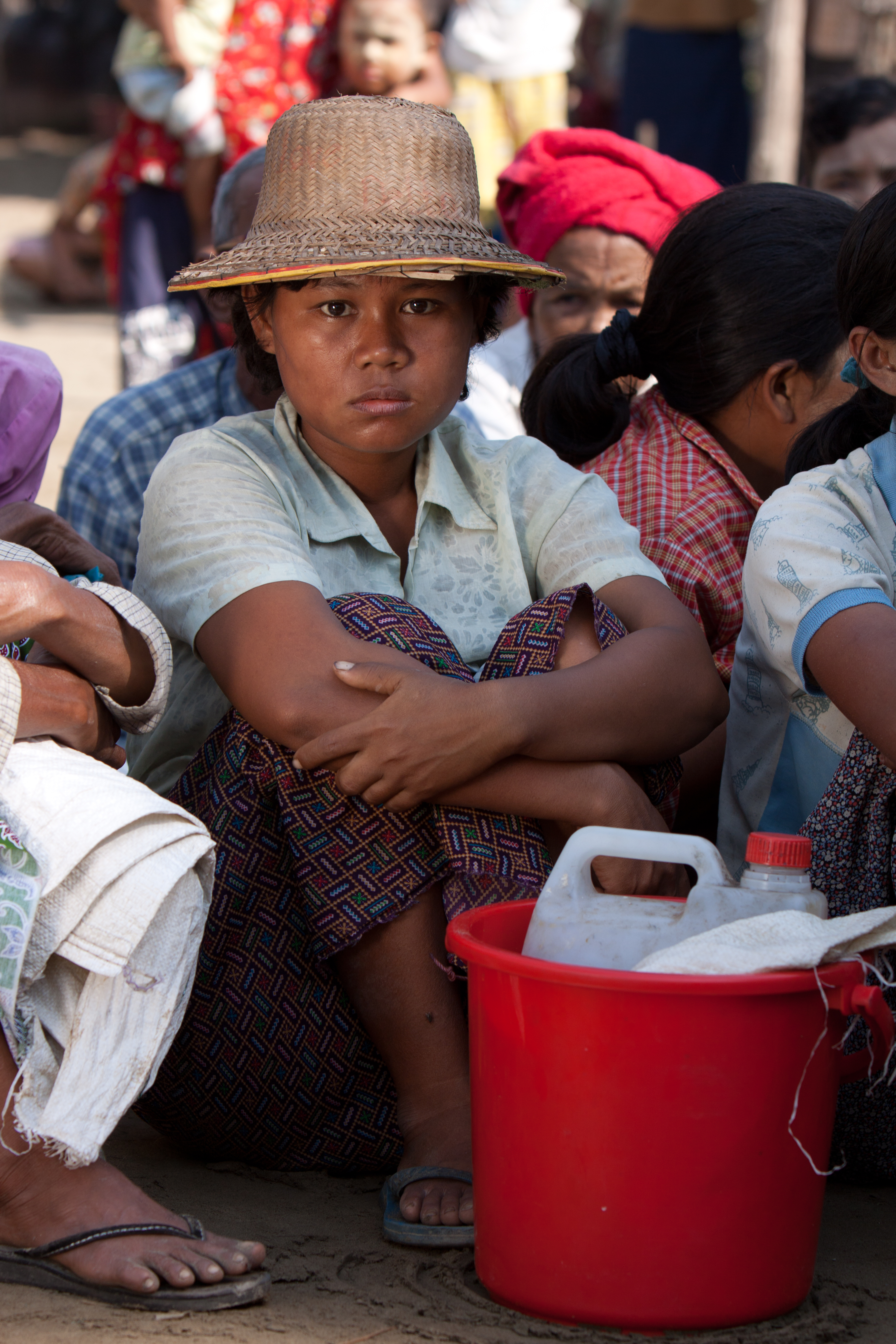 Woman waits for Emergency Food