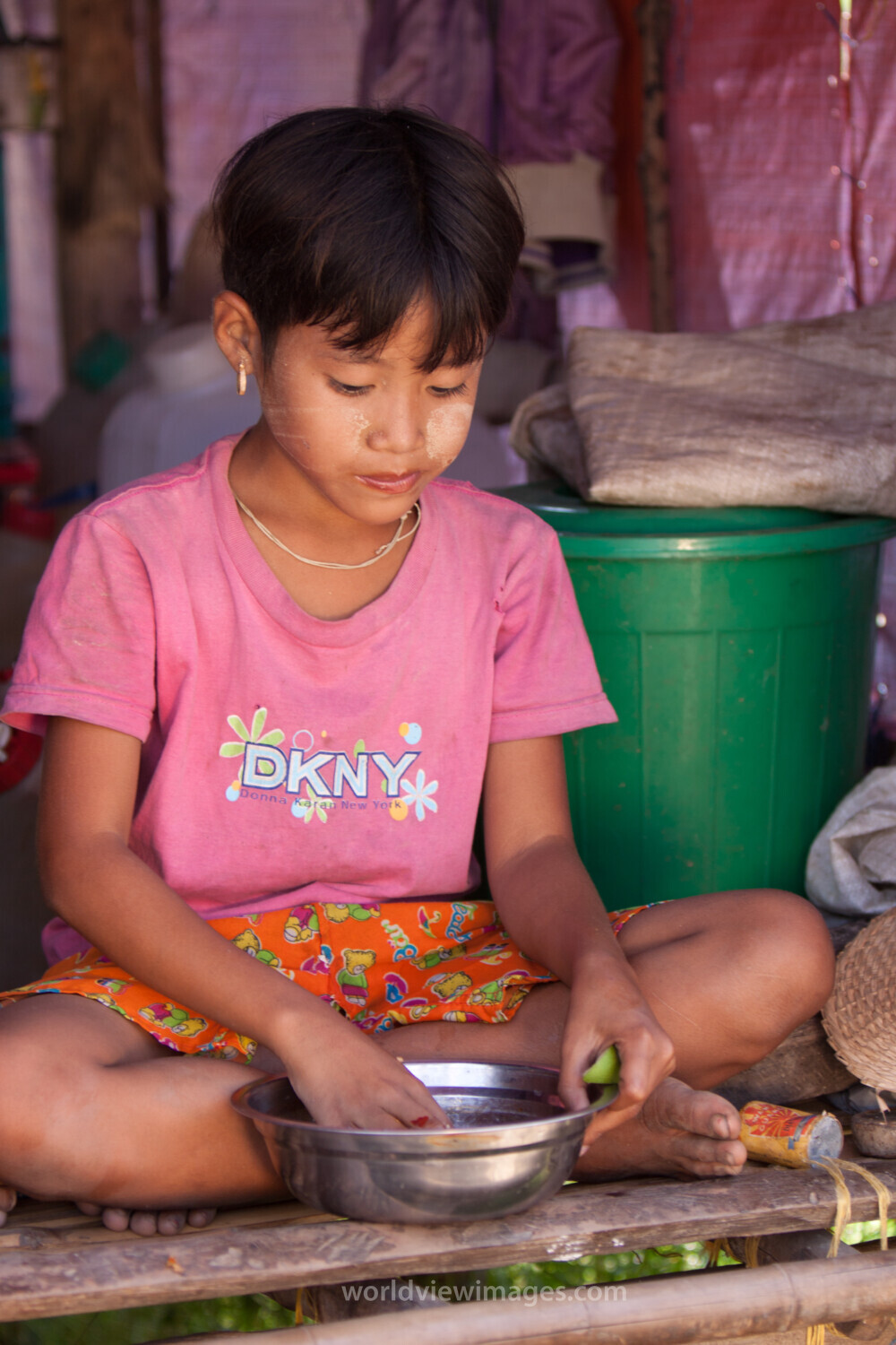 Girl Eats Rations in Burma