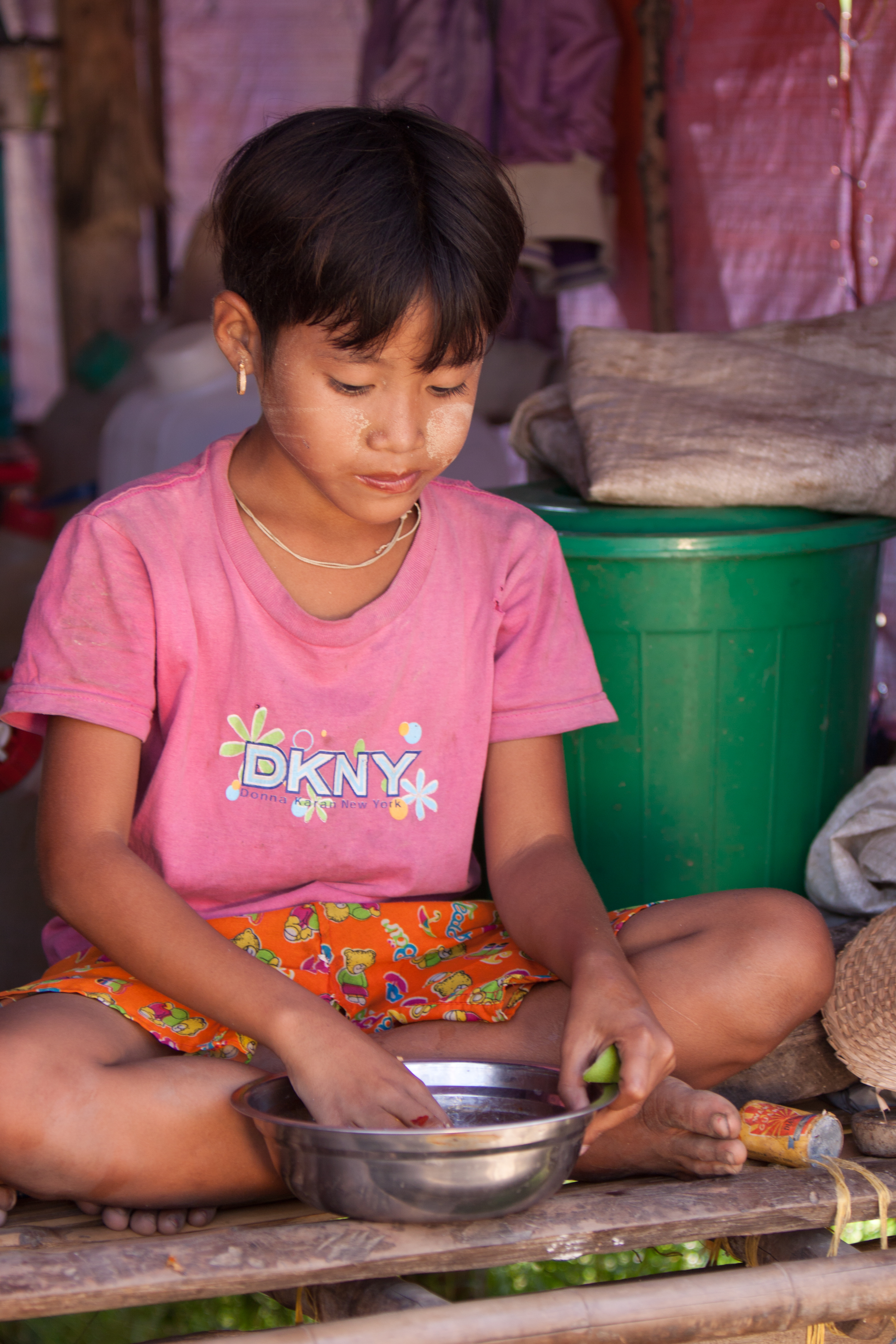 Girl Eats Rations in Burma