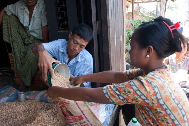 Food Distirbution after Cyclone in Burma — With all of their crops and fields destroyed by the salt water of cyclone Nargis, villagers of the Irrawaddy Delta...