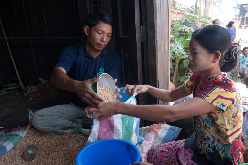 Food Distirbution after Cyclone in Burma — With all of their crops and fields destroyed by the salt water of cyclone Nargis, villagers of the Irrawaddy Delta...