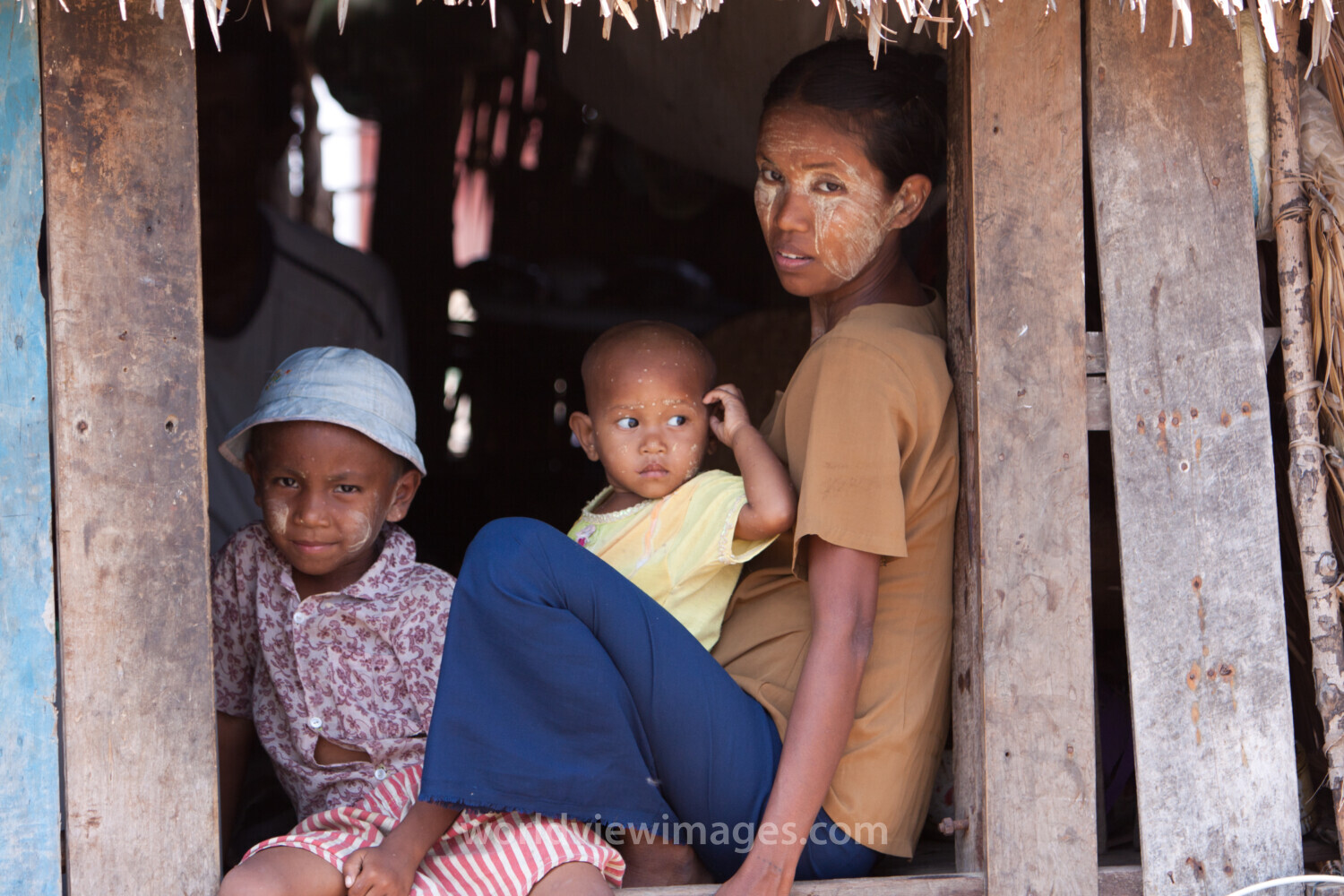 People in Myanmar Doorway
