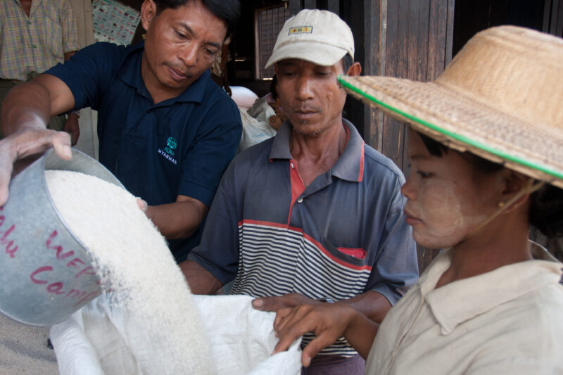 Food Distirbution after Cyclone in Burma — With all of their crops and fields destroyed by the salt water of cyclone Nargis, villagers of the Irrawaddy Delta...