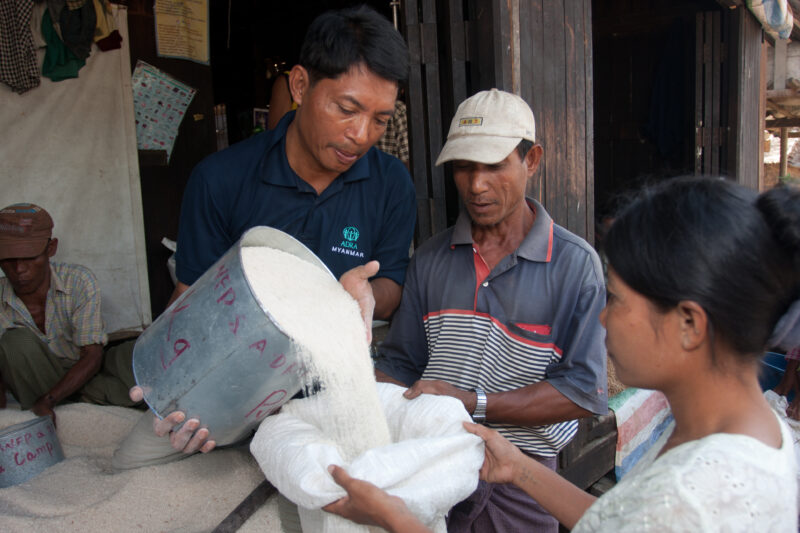 Food Distirbution after Cyclone in Burma — With all of their crops and fields destroyed by the salt water of cyclone Nargis, villagers of the Irrawaddy Delta...