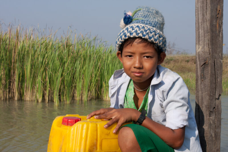 Collecting Water in the Delta — Finding and collecting water, safe for cooking and drinking was a challenge after Cyclone Nargis, as most of the water source...