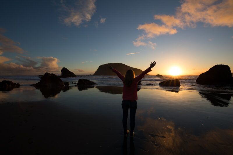 Sunset on the Oregon Coast — Woman gives thanks for the beauty of the Earth — Beach, Coast, Ocean, Oregon, Sea