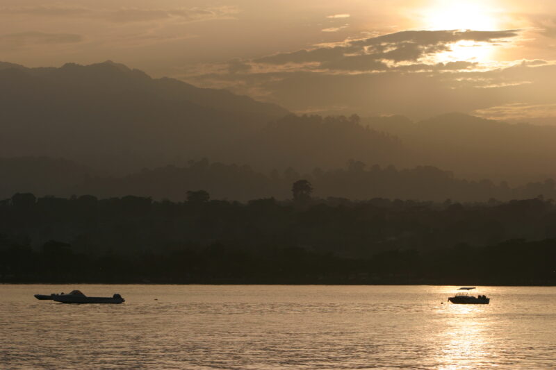 Sunset in Sao Tome — A boat in the harbor of the Capital of Sao Tome, — Sao Tome, Africa, Poverty, sunset, sunsets