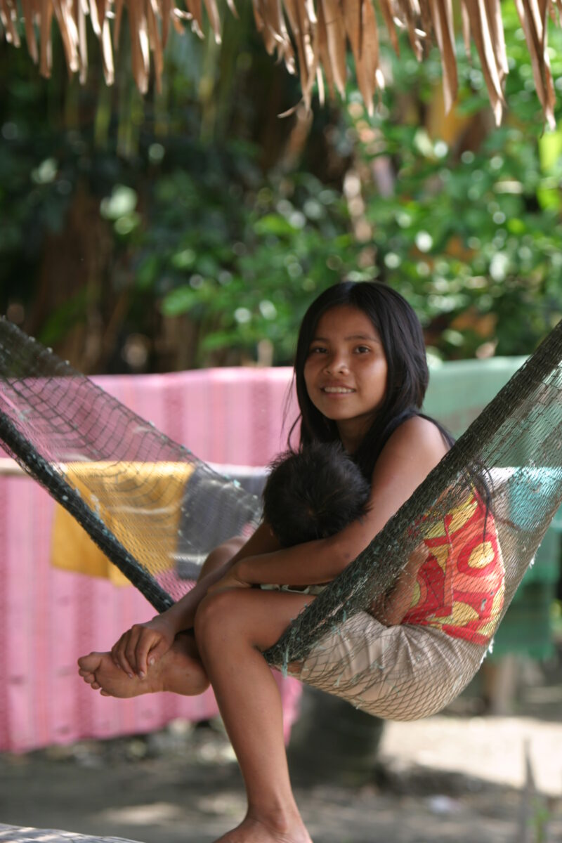 Ethnic Girl in Peru — Shipibo Indian children rest in a Hammock — Peru, ADRA, Poverty, Development, Amerindian