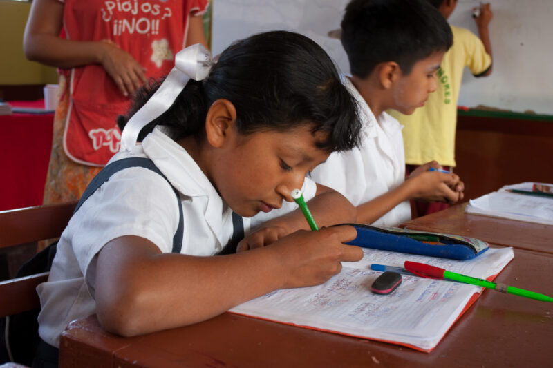 Student in Peru — Girl from poor community near Lima, attends school, now that her mother is gaining income from her new business that she has started, thank...