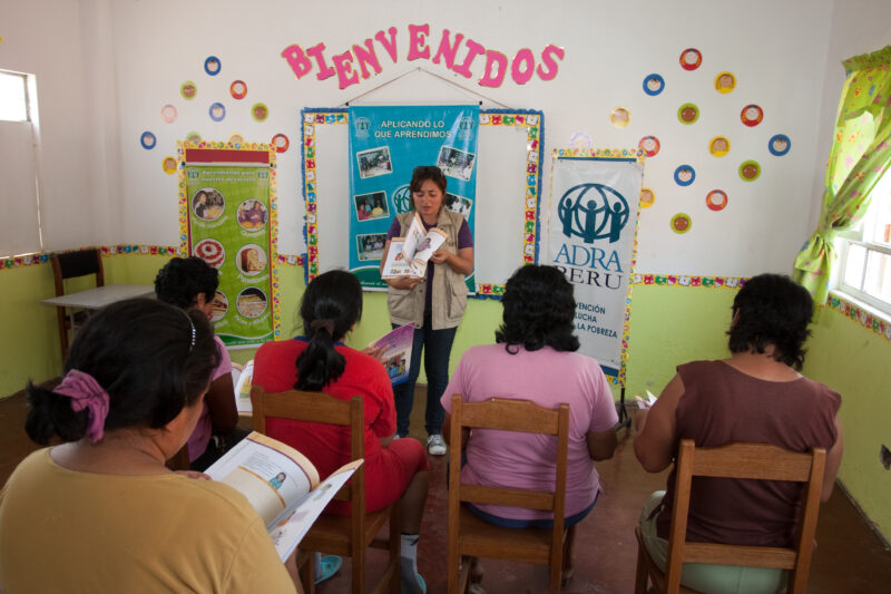 Health Instruction — Women living in a poor community on the outskirts of Lima, attend a weekly workshop for instruction in an ADRA program that brings Adult...