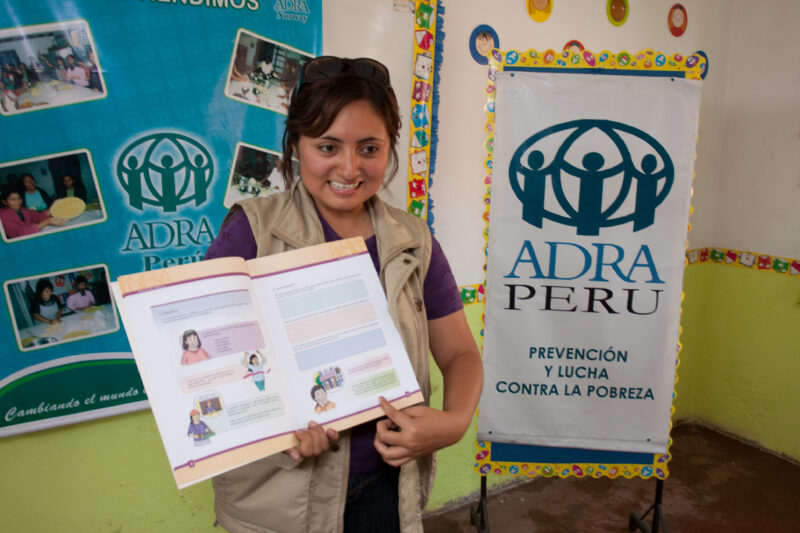 Health Instruction — Women living in a poor community on the outskirts of Lima, attend a weekly workshop for instruction in an ADRA program that brings Adult...