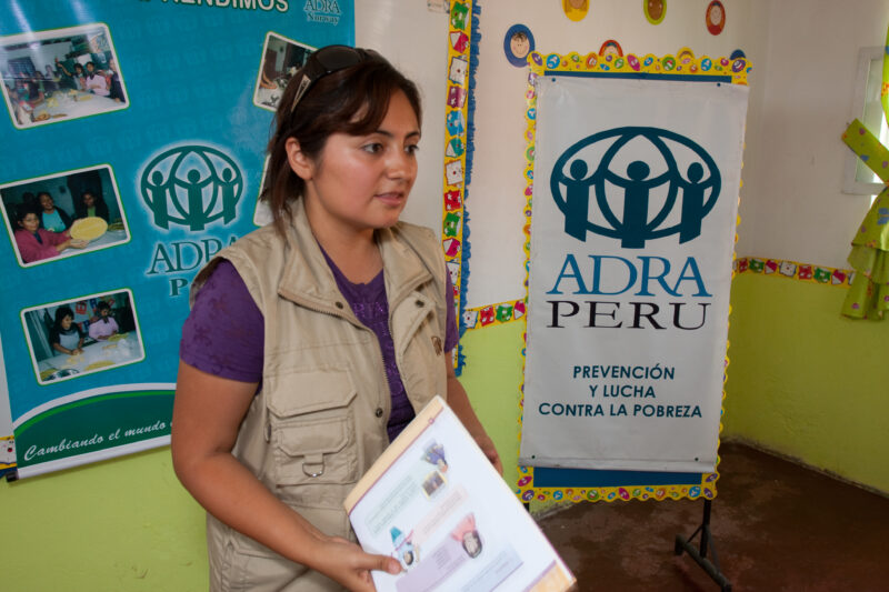 Health Instruction — Women living in a poor community on the outskirts of Lima, attend a weekly workshop for instruction in an ADRA program that brings Adult...