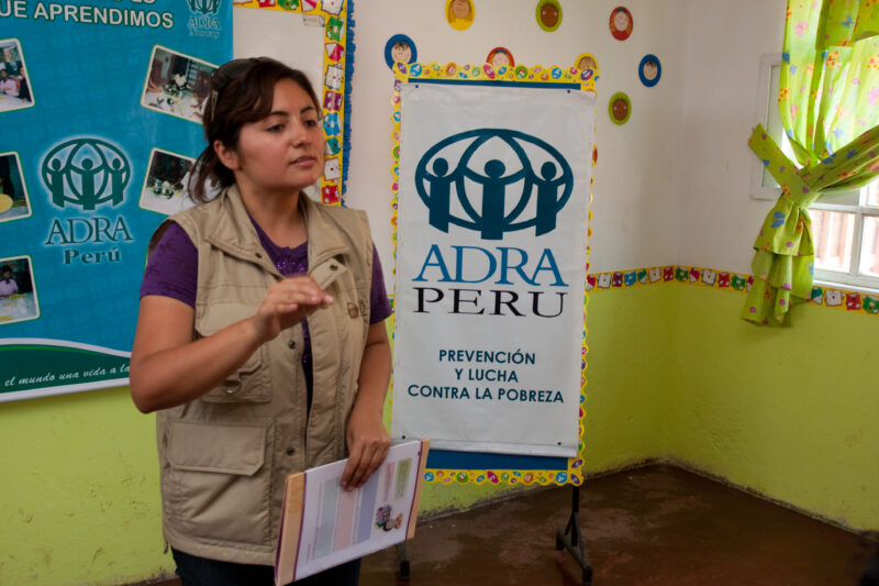 Health Instruction — Women living in a poor community on the outskirts of Lima, attend a weekly workshop for instruction in an ADRA program that brings Adult...