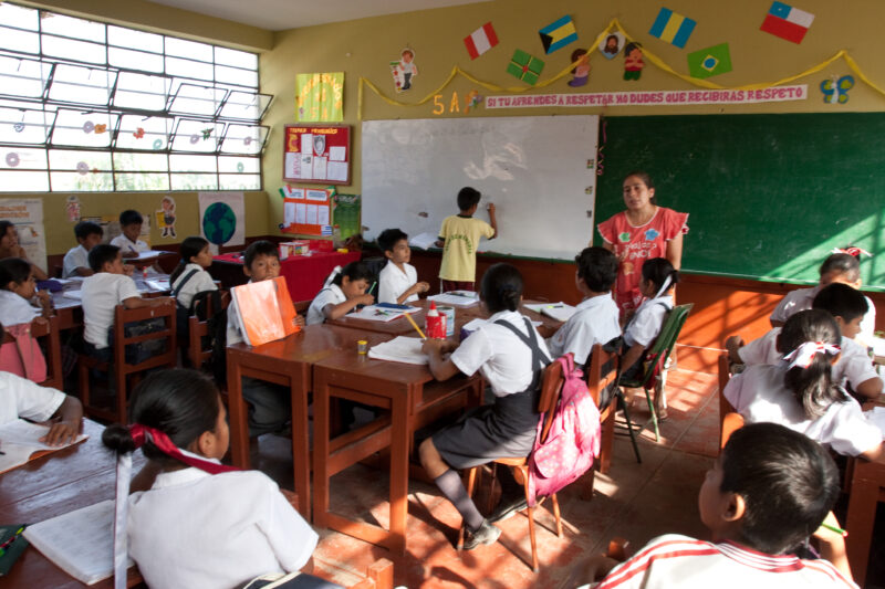 Going to school — Girl from poor community near Lima, attends school, now that her mother is gaining income from her new business that she has started, thank...
