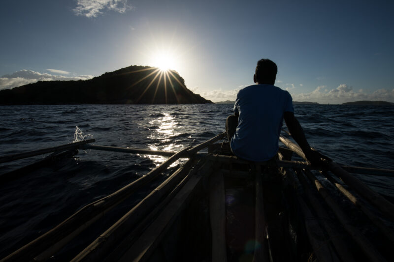 Going Fishing — Fishermen head out in the evening light for a night of fishing. — Philippines, Camarines Sur, Luzon, fishing, boat