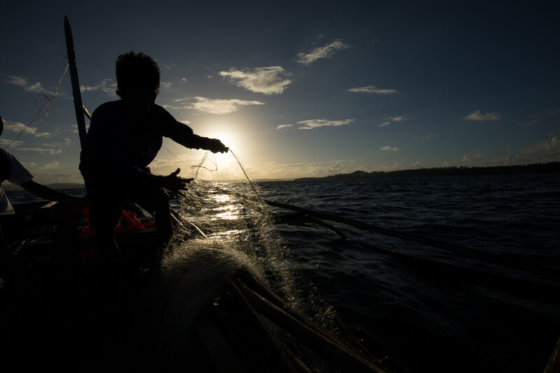 Going Fishing — Fishermen head out in the evening light for a night of fishing. — Philippines, Camarines Sur, Luzon, fishing, boat