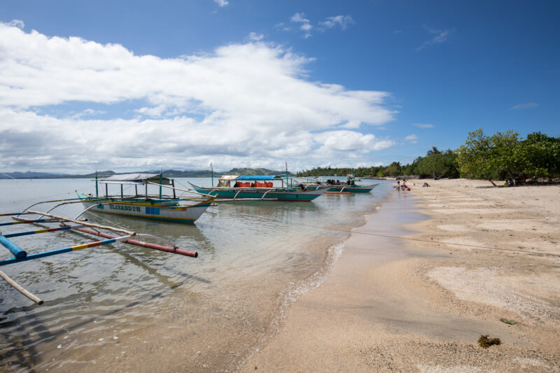 Water Taxis — Boats used for local transportation to islands off the coast of the Philippines. — Philippines, Camarines Sur, Luzon, scenic, ocean