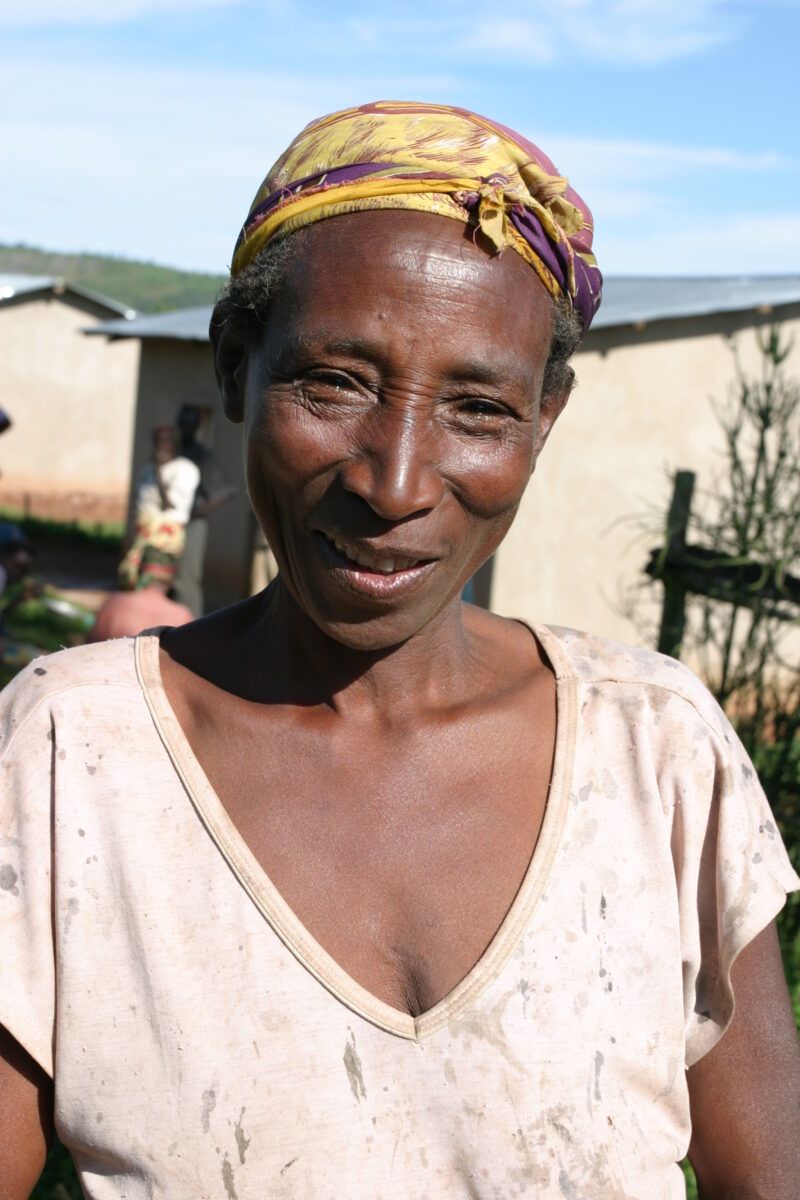 Woman in Rwanda — People returning to Rwanda after the genocide was overreclaim land in a unpopulated swampy area, with technology and financial support from...