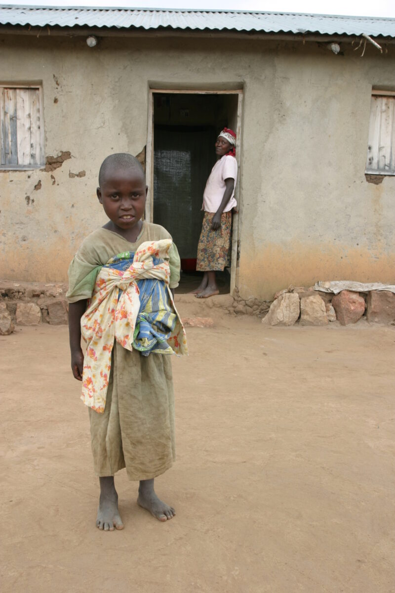Stock Images of Rwanda — People returning to Rwanda after the genocide was overreclaim land in a unpopulated swampy area, with technology and financial suppo...