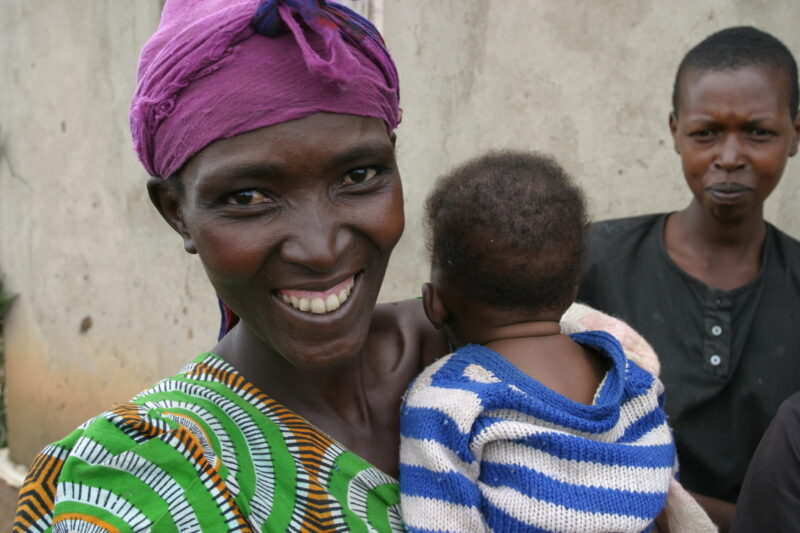 Woman in Rwanda — People returning to Rwanda after the genocide was overreclaim land in a unpopulated swampy area, with technology and financial support from...