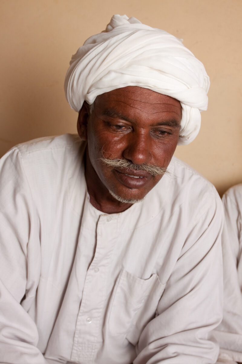 Men’s Group in Sudan — Men meet together to discuss the issues of the village in an ADRA directed "reflect" group meeting, in Sudan, Africa — Africa, S...