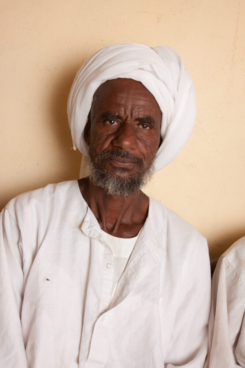 Men’s Group in Sudan — Men meet together to discuss the issues of the village in an ADRA directed "reflect" group meeting, in Sudan, Africa — Africa, S...